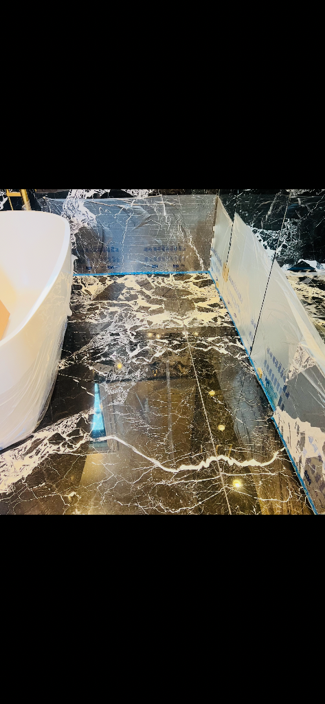 Before: marble bathroom restoration